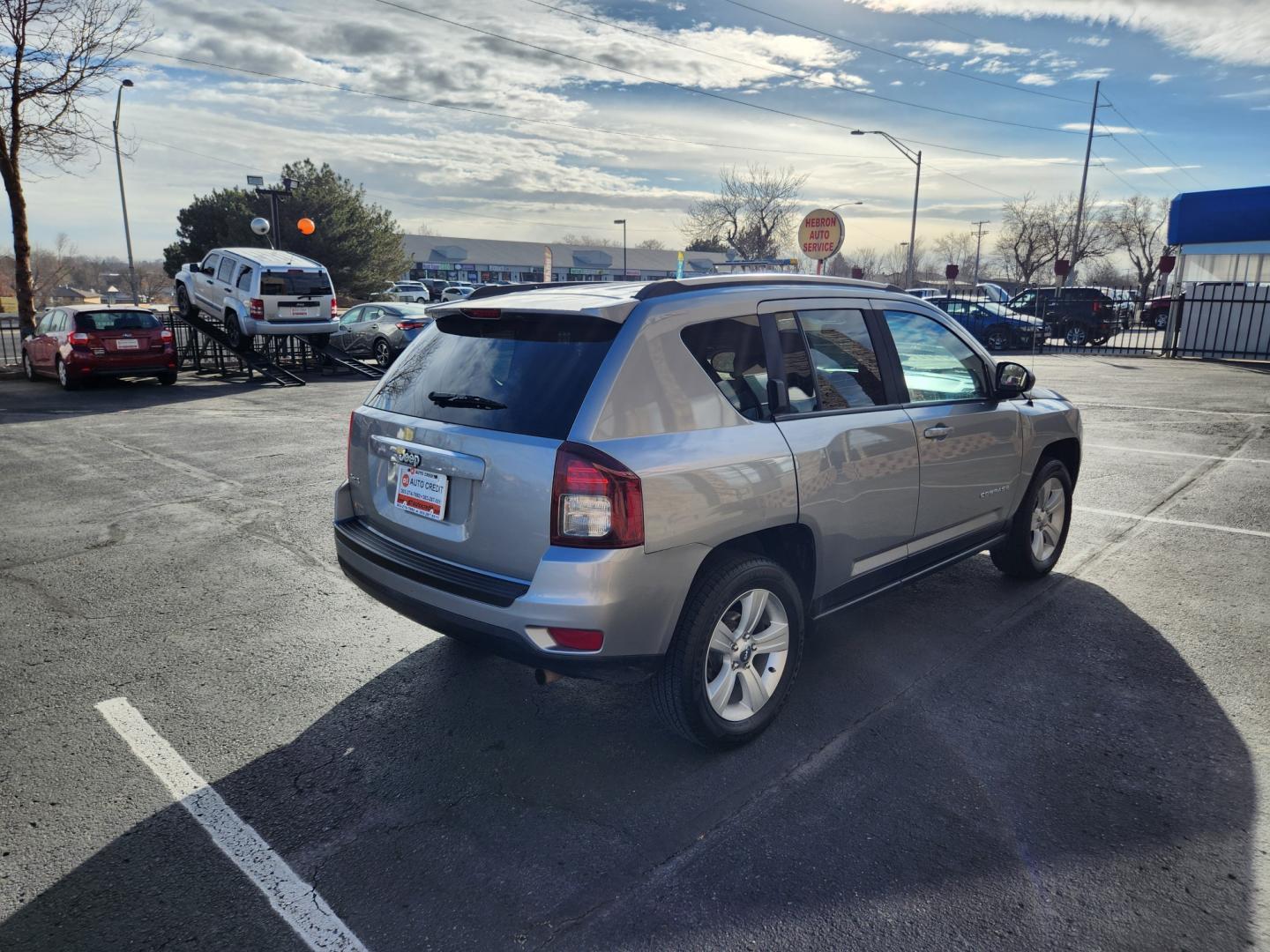 2015 Billet Silver Metallic Clearcoat /Dark Slate Gray Jeep Compass Sport (1C4NJDBB9FD) with an 2.4L I4 DOHC 16V Dual VVT engine, Automatic transmission, located at 8595 Washington St., Thornton, CO, 80229, (303) 287-5511, 39.852348, -104.978447 - 2015 Jeep Compass<br><br>D1 Auto NEVER charges dealer fees! All cars have clean titles and have been inspected for mechanical issues. We have financing for everyone. Good credit, bad credit, first time buyers.<br><br>Please call Lakewood Location 303-274-7692 or Thornton 303-287-5511 to schedule a t - Photo#5